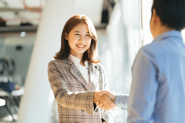 Hand shaking with coach